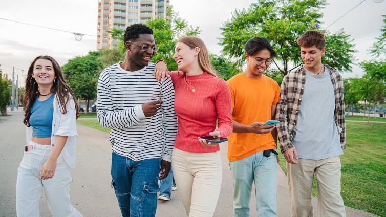 Friends talking and walking
